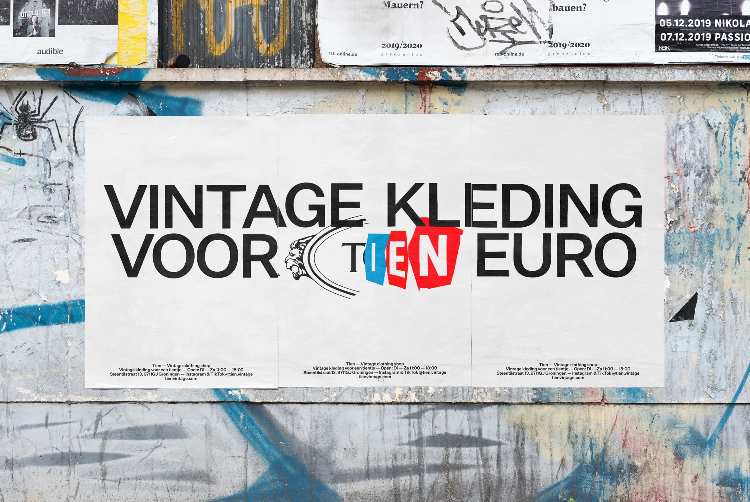 Three TIEN posters wheat-pasted on a graffiti wall reading "VINTAGE KLEDING VOOR TIEN EURO", with the TIEN wordmark assembled from letters cut from existing brand logos.