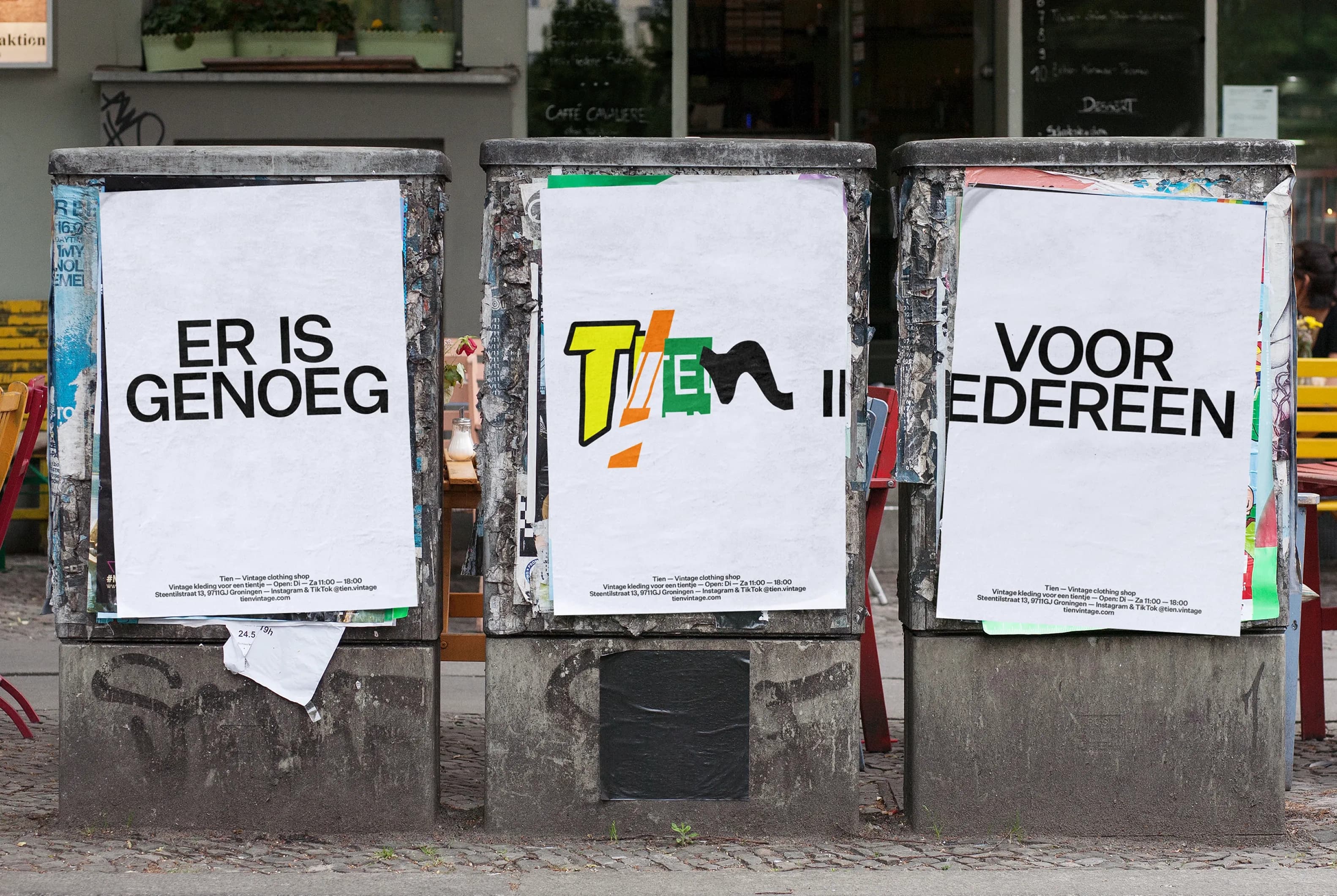 Three TIEN posters wheat-pasted on a street column reading "ER IS GENOEG TIEN IS VOOR IEDEREEN", with a logo variation assembled from letters cut from existing brand logos on the center poster.