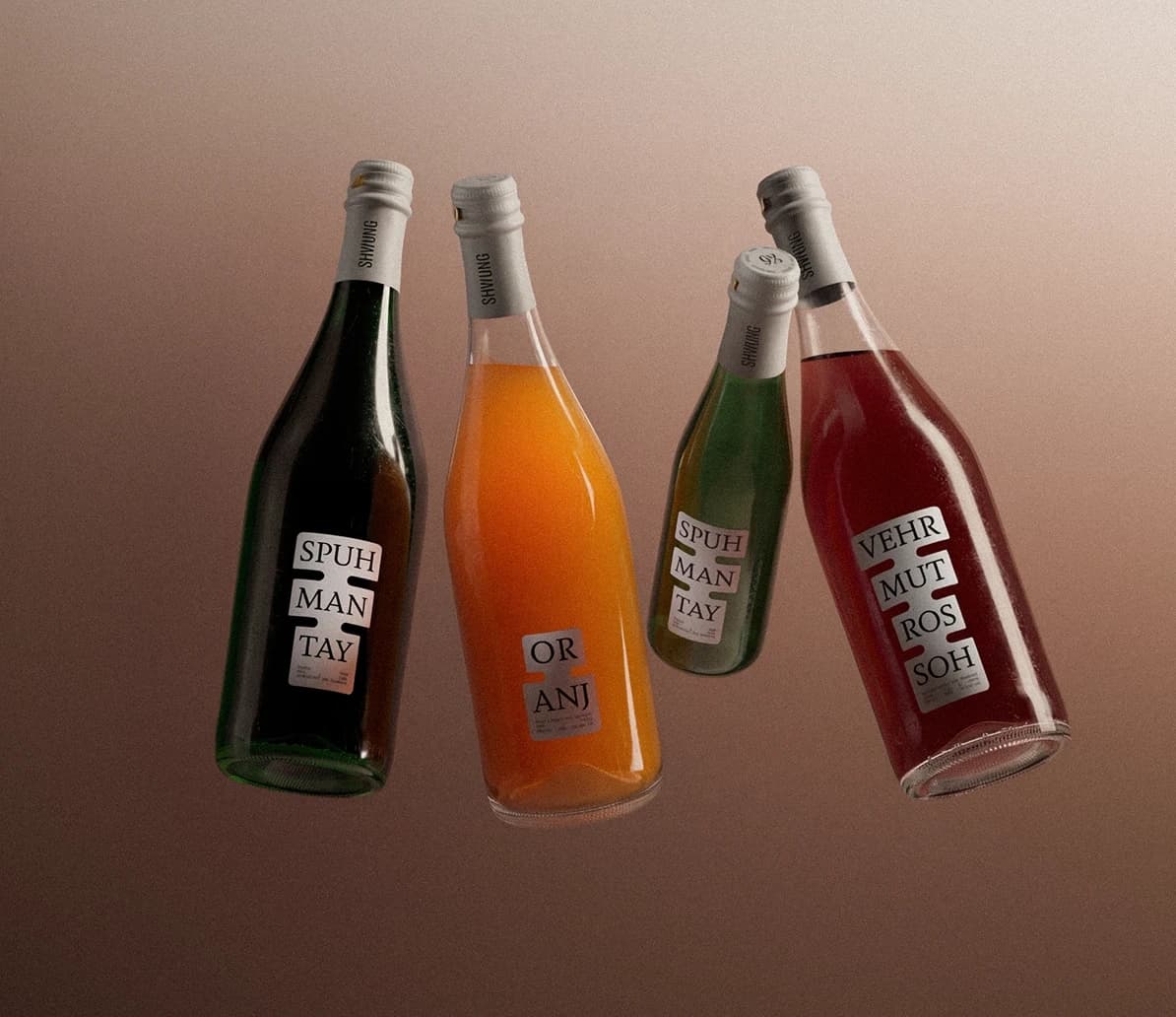 Four Shwung wine bottles hanging from a rack against a yellow-green background, showing the label system in context.