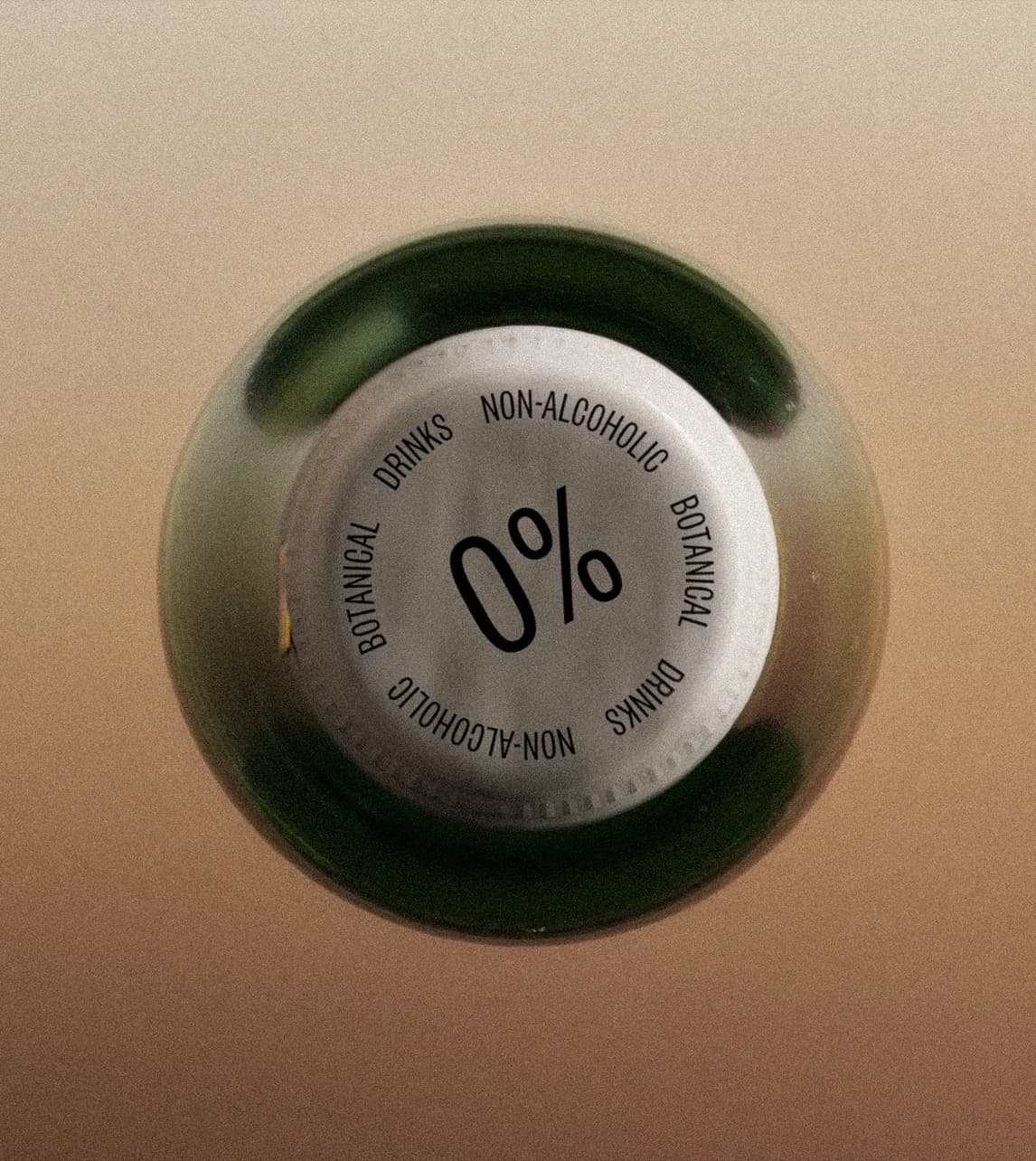 Close-up detail of a Shwung bottle necks showing the label typography and sticker system.