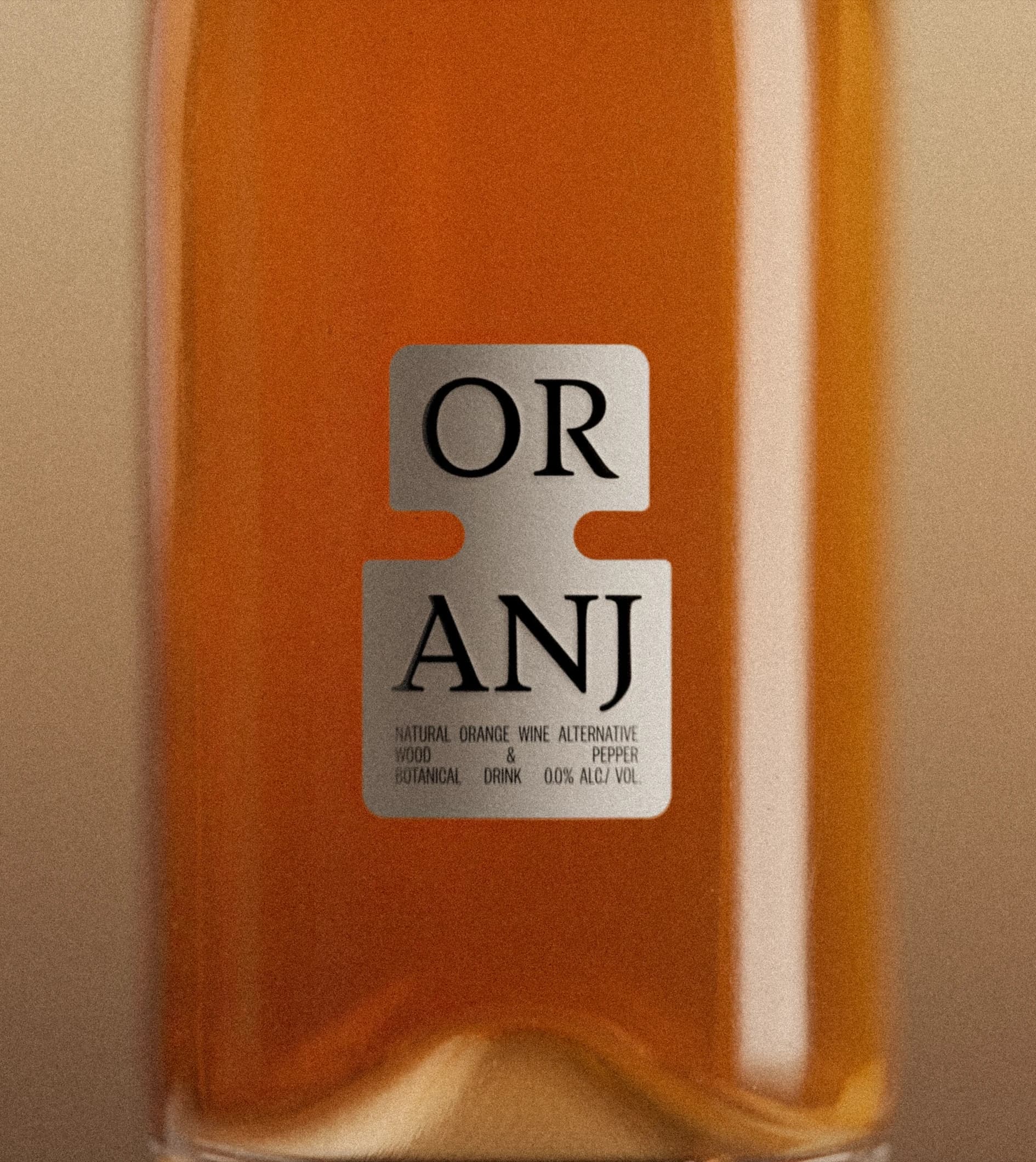 Close-up detail of two Shwung bottle showing the label typography and sticker system.