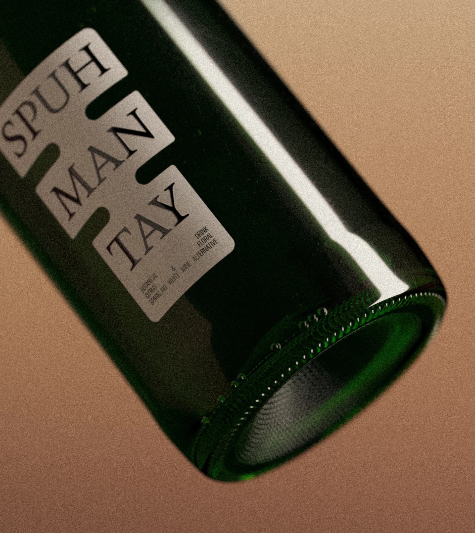 Close-up detail of two Shwung bottle showing the label typography and sticker system.