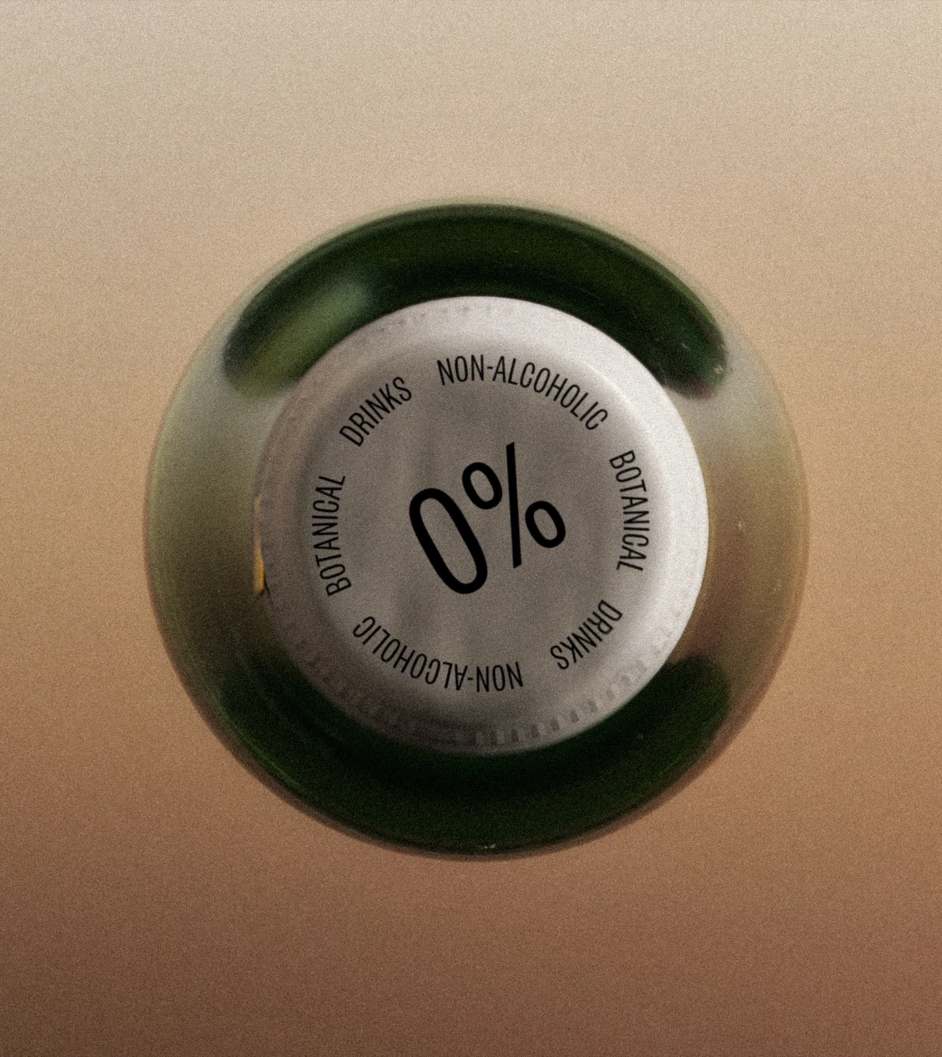 Close-up detail of a Shwung bottle necks showing the label typography and sticker system.